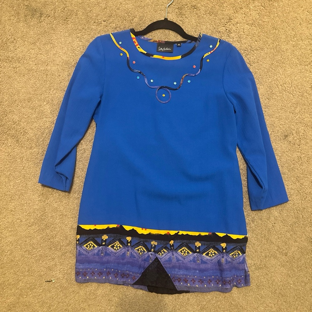 Anthony Mark Hankins - Blue Top with Yellow Accents